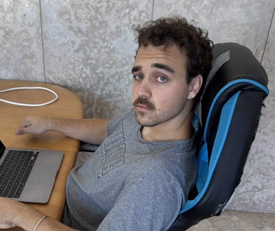 Me at my desk, halfway down some rabbit hole